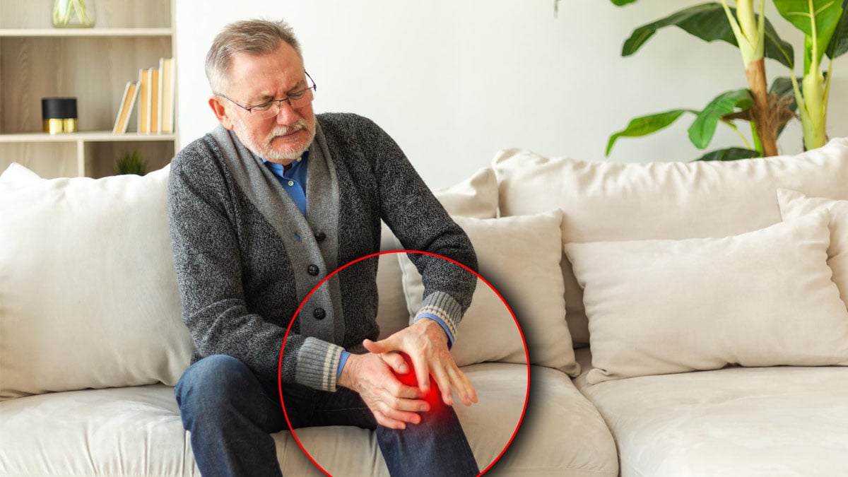 homme âgé avec une douleur au genou ciblé en rouge